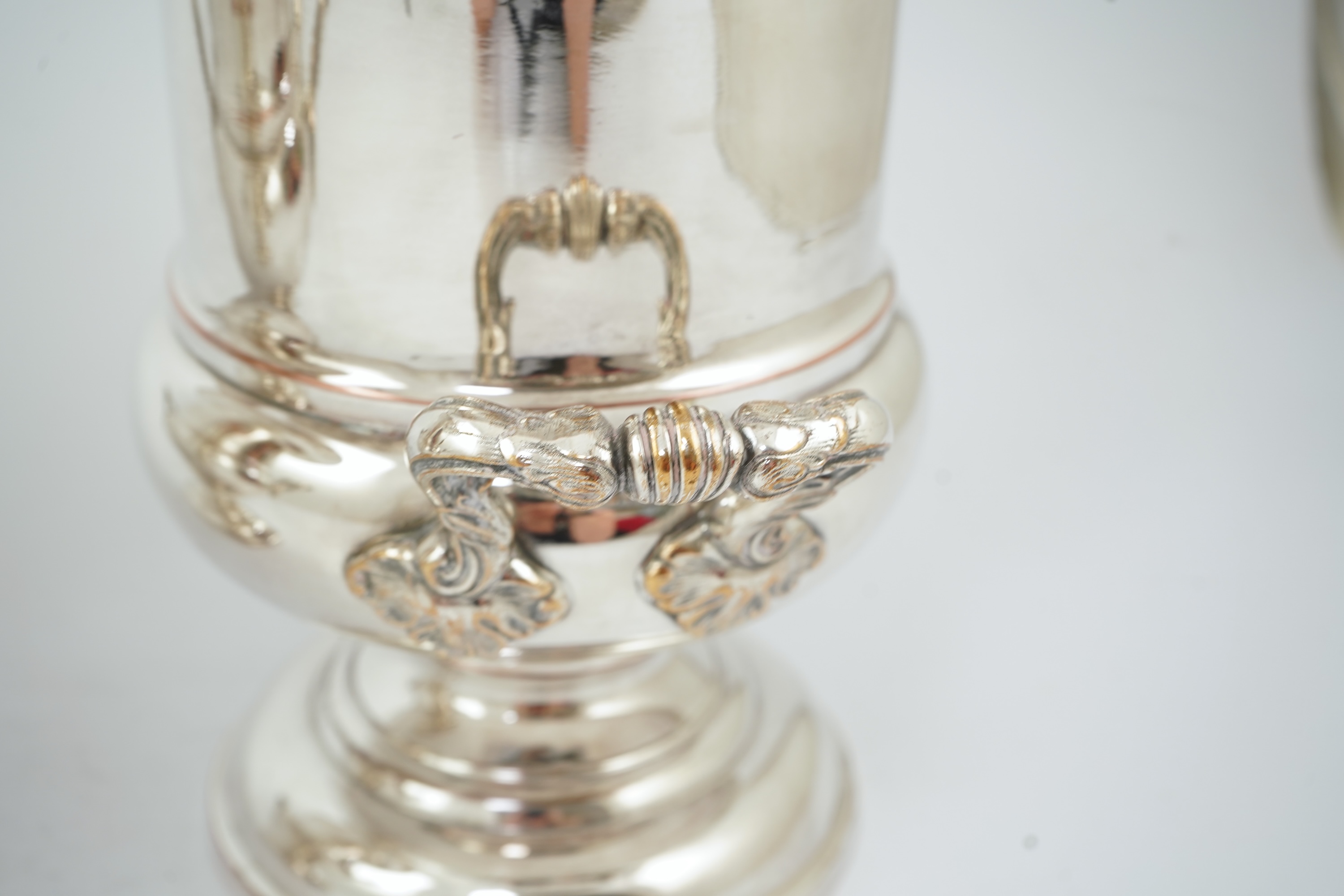 A pair of late 19th/early 20th century silver plated two handled campana shaped wine coolers, makers, FH